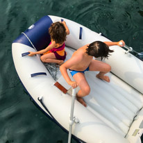 Vathi - 21 August 2017 / Alana and Oscar in the dinghy